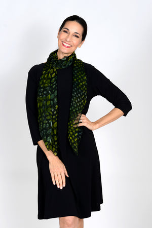 Add style and grace to your outfit with all-day comfort and appeal! The Oliver Dots Scarf is handmade in the batik tie-dye technique featuring a wave of colorful varied dots on a semi-transparent black background. _33816041783496