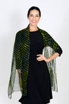 Add style and grace to your outfit with all-day comfort and appeal! The Oliver Dots Scarf is handmade in the batik tie-dye technique featuring a wave of colorful varied dots on a semi-transparent black background. _t_33816041750728