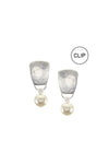 The Pearl Taper Clip-On Earrings feature a luminous cream colored Austrian crystal pearl dangling from a silver colored, tapered rounded rectangle with standard clip on backing._t_33122121973960