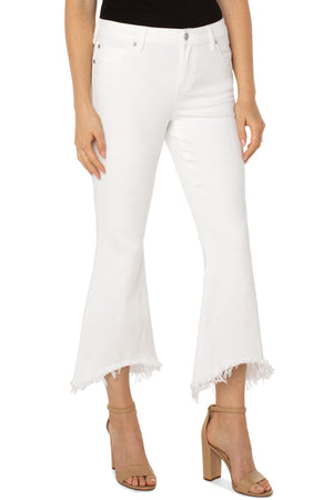 Liverpool Hannah Crop Flare with Curved Hem in White. Mid rise 5 pocket jean with button and zip closure. 5 pocket styling. Belt loops. Flared crop with frayed curved hem. 27" inseam._34112786137288