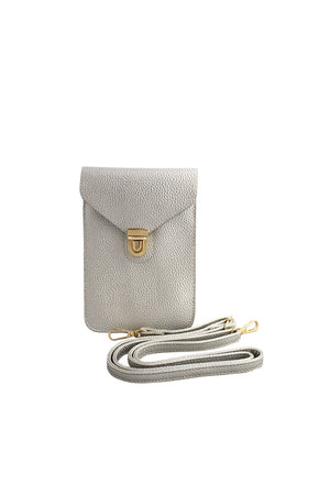 The Mini Snap Crossbody Bag is a fashionable and smart accessory to go with everything! This mini handbag made from durable vegan leather with a golden front snap buckle is ideal for storing small items such as cards, coins, keys, lipstick, or phone. _32765615472840