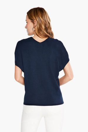 This sustainable sweater features a fun and bright design that pops against the deep indigo background, a flattering v-neck, and roomy short sleeves. The NIC+ZOE Color Spun Sweater is just as comfy as it is eye-catching!_34057381413064