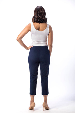 Holland Ave Susan Denim Crop PantHolland Ave Susan Denim Crop Pant in Denim. Pull on hidden waistband pant with faux zipper flap. Snug through hip falls straight to hem. Side slits. 25" inseam._13297494884461