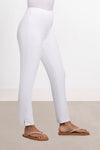 Sympli Narrow Pant Midi in White. Hidden elastic waist pull on pant with slim leg. Side slits at hem. 28" inseam_t_33995505402056