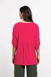 Sympli Elbow Sleeve Safari Top in Watermelon. Scoop neck elbow sleeve top with button tab. Single front patch pocket with flap. High low hem. Side slits. Relaxed fit._t_33977432572104