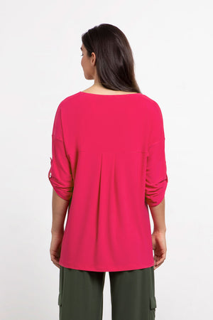 Sympli Elbow Sleeve Safari Top in Watermelon. Scoop neck elbow sleeve top with button tab. Single front patch pocket with flap. High low hem. Side slits. Relaxed fit._33977432572104